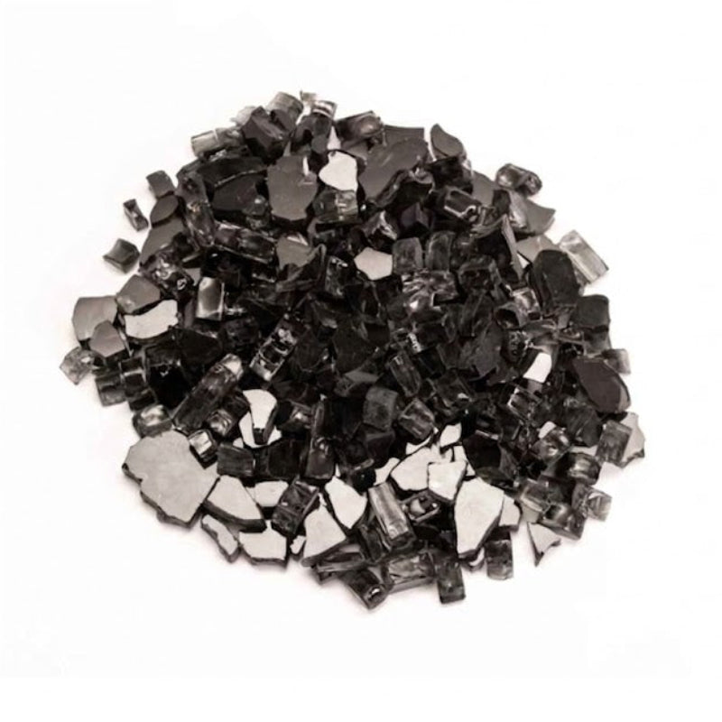 Small black metallic pieces of glass on a white background