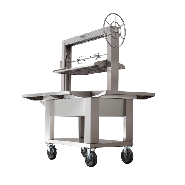 Stainless steel Brasa Grill with wheels, shelves and a rotisserie on a white background