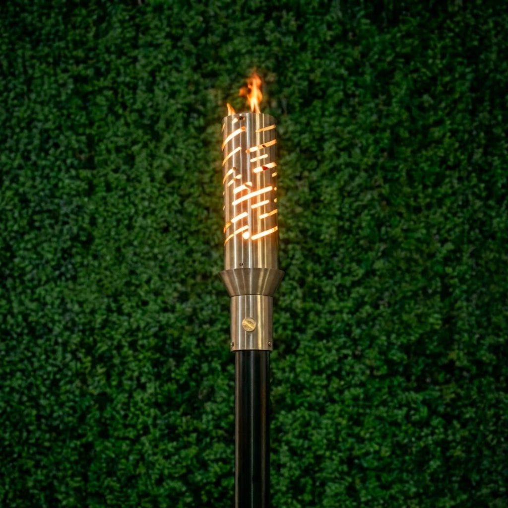 Classic 304 Stainless Steel Comet Torch head and 68-inch mounting post by The Outdoor Plus in garden setting