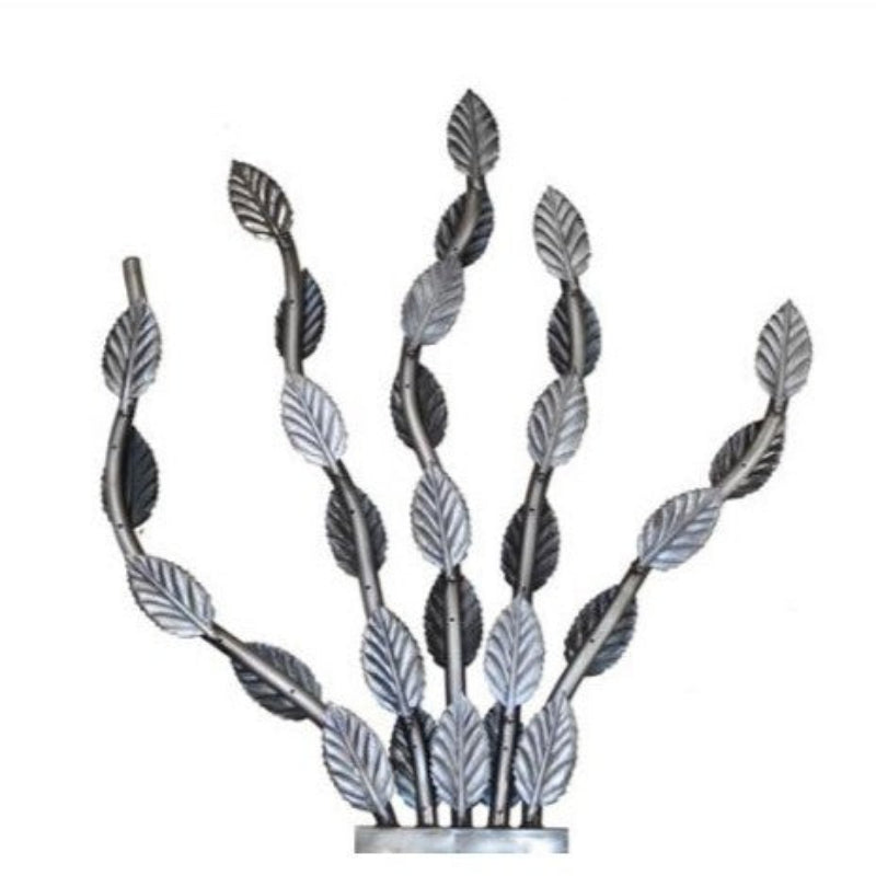 Decorative metal plant with leaf design on a white background
