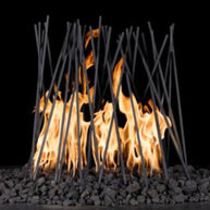 Fireplace with burning wood logs against a black background