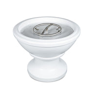 White ceramic bowl with a centralmetal fire pit insert white background
