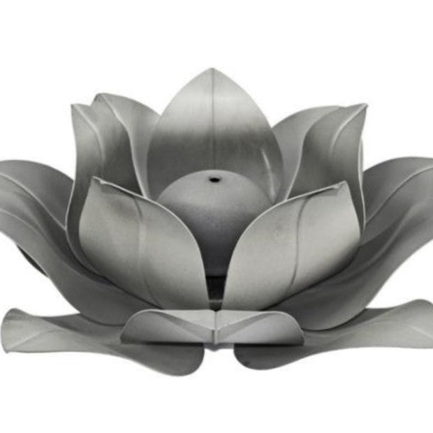 Silver lotus flower-shaped fire feature on a white background