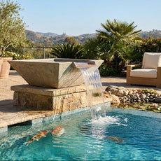 Maya Square GFRC Water Bowl by The Outdoor Plus in Rustic Coffee finish flowing into a luxury pool.