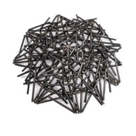 Pile of black metal stakes on a white background