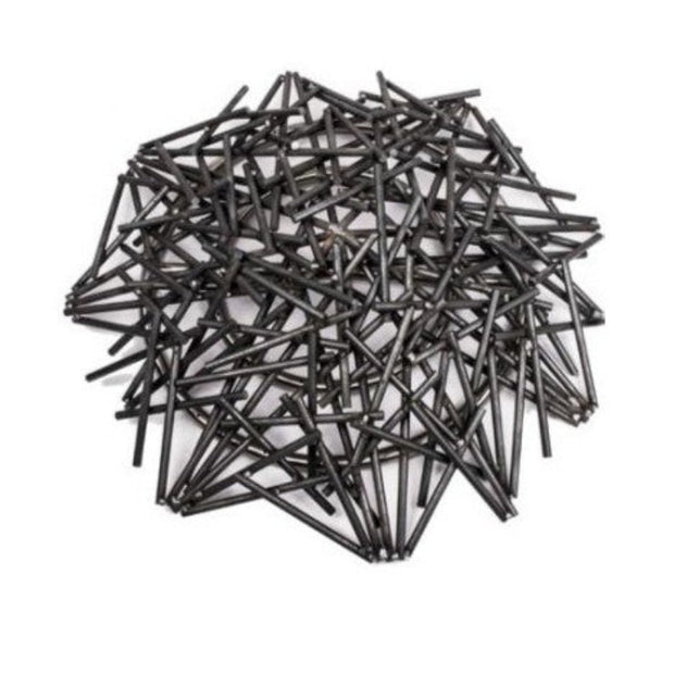 Pile of black metal stakes on a white background