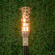 The Outdoor Plus Woven Stainless Steel Torch head with 68-inch support post and anchor.