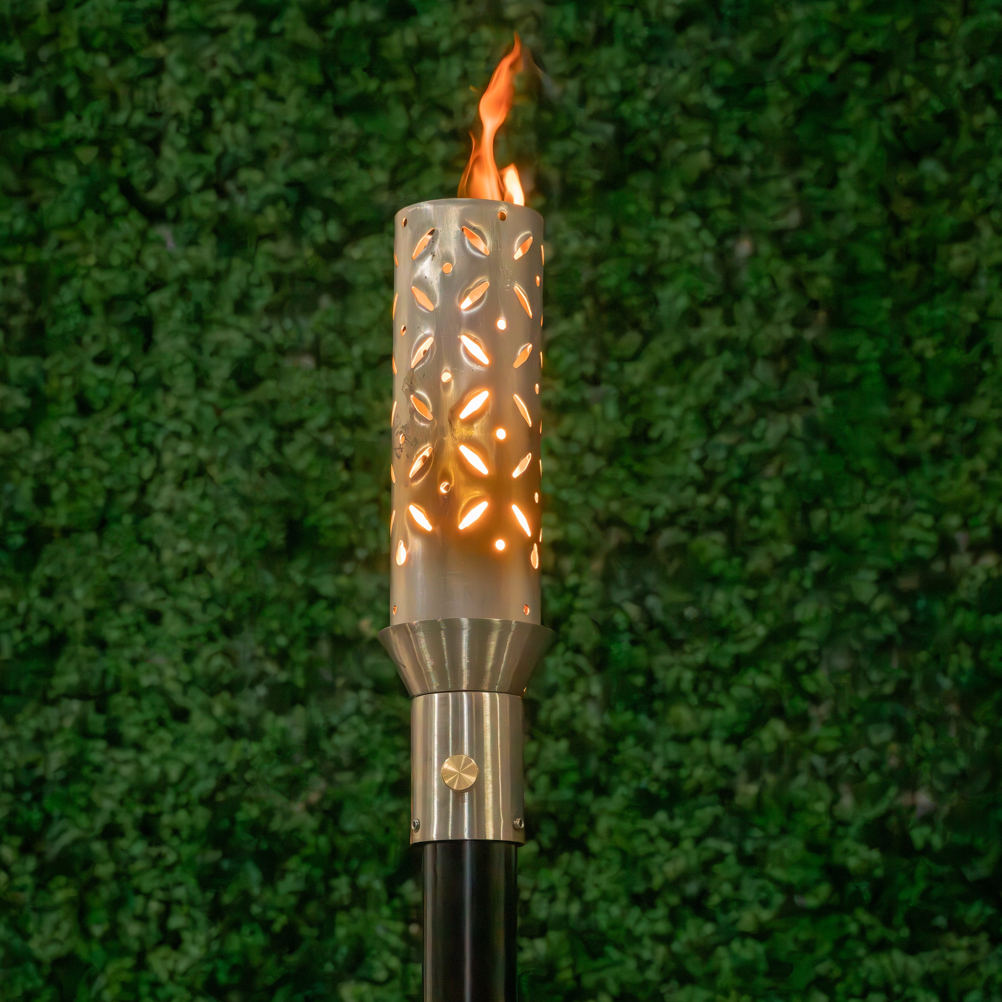 Geometric 304 Stainless Steel Diamond Torch head and 68-inch mounting post by The Outdoor Plus in garden setting.