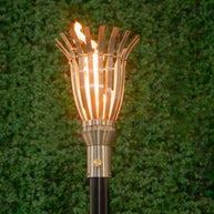 Classic 304 Stainless Steel Basket Torch head and 68-inch mounting post by The Outdoor Plus in outdoor garden setting.