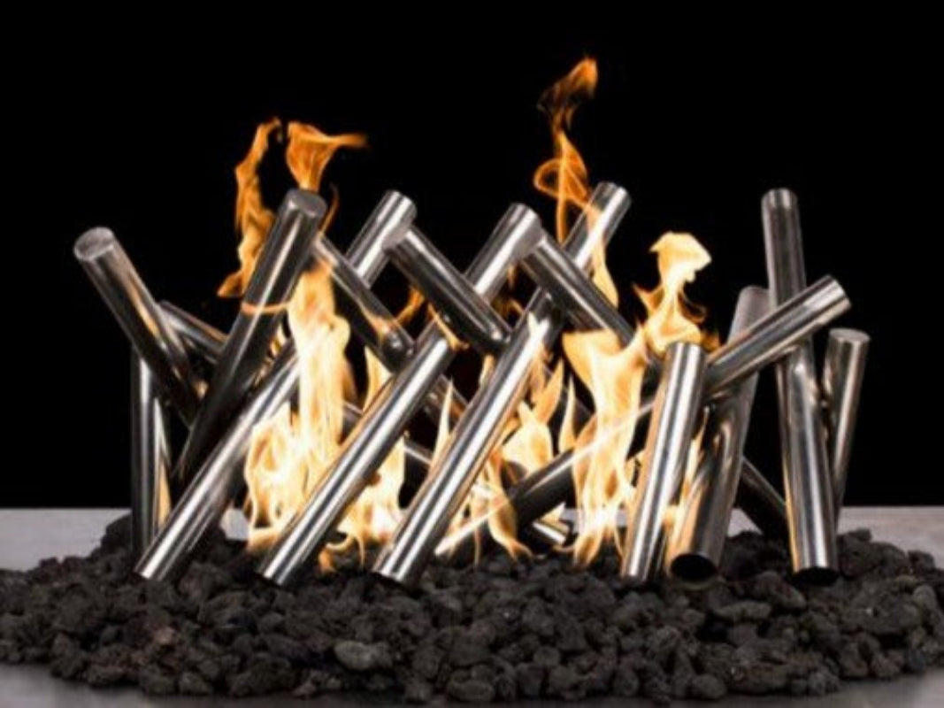 Metal fire pit logs with flames against a black background