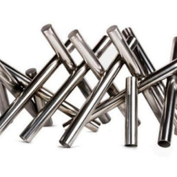 Stack of metal tubes on a white background