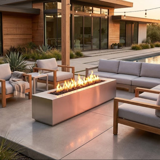 Outdoor patio with modern furniture and fire pit in a residential setting