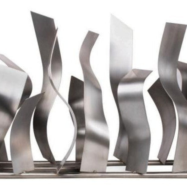 Metallic abstract sculpture with wavy patterns on a white background