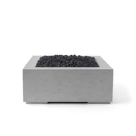 Square concrete fire pit with lava rock on a white background