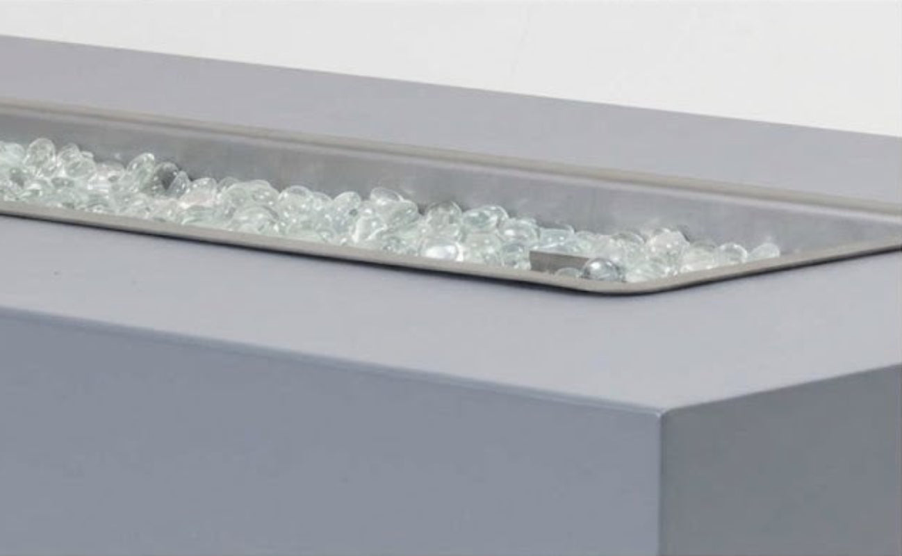 Close-up of a fire pit with glass beads on a white background